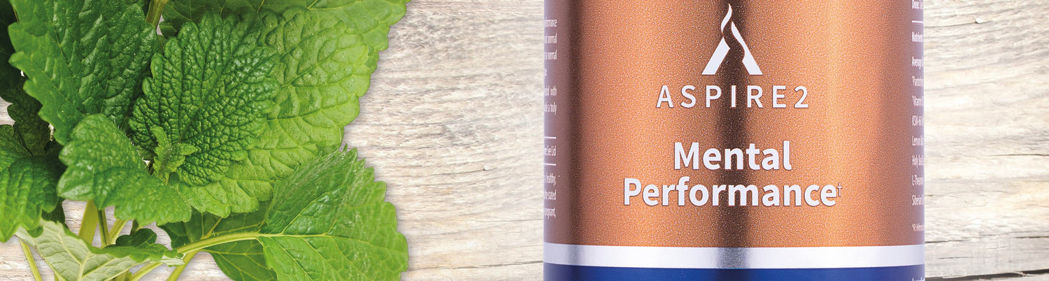 Aspire 2 Mental Performance Image showing lemon balm and a bottle of Aspire 2 Mental Performance