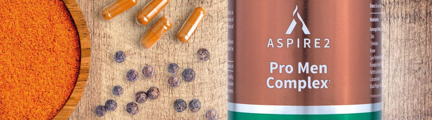 Aspire 2 Pro Men Complex Image showing turmeric, black pepper and a bottle of Aspire 2 Pro Men Complex